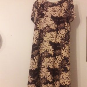 Brown and creamed colored dress